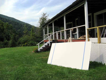 Big Canvas propped against the easel in the back yard of Cedar Pines